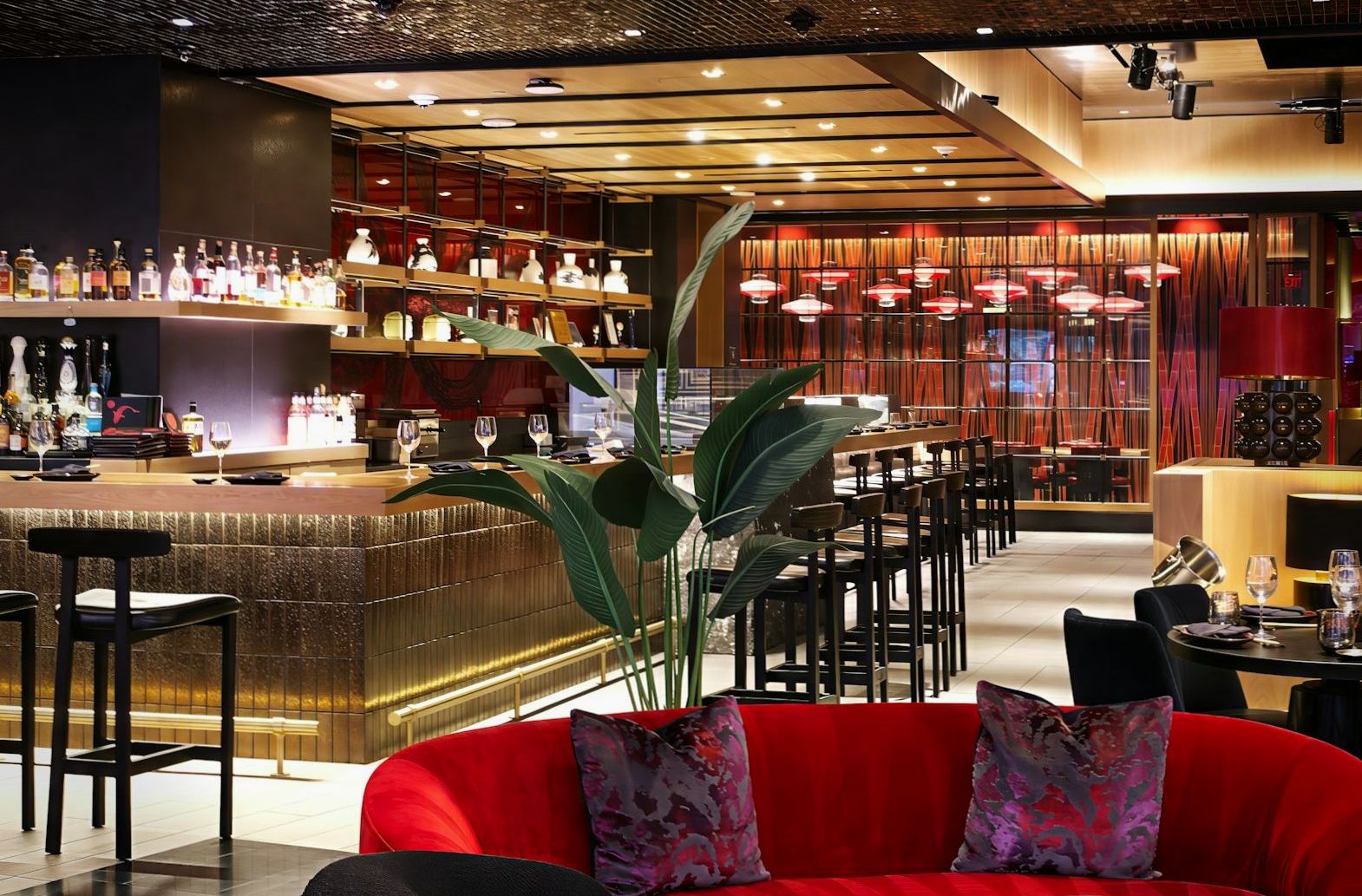 Elegant red lounge seating in a premium evening interior